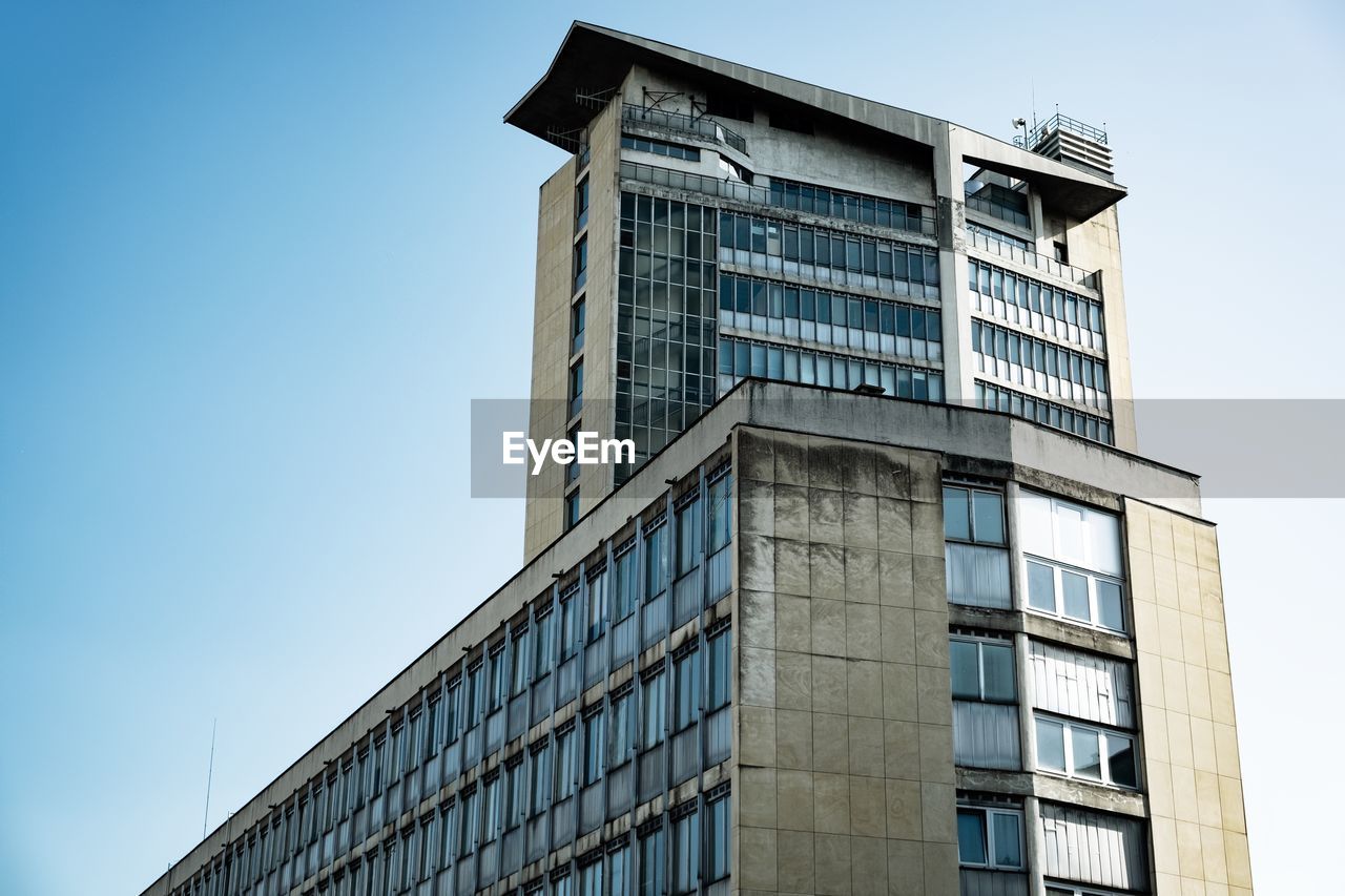 Low angle view of modern building against clear sky