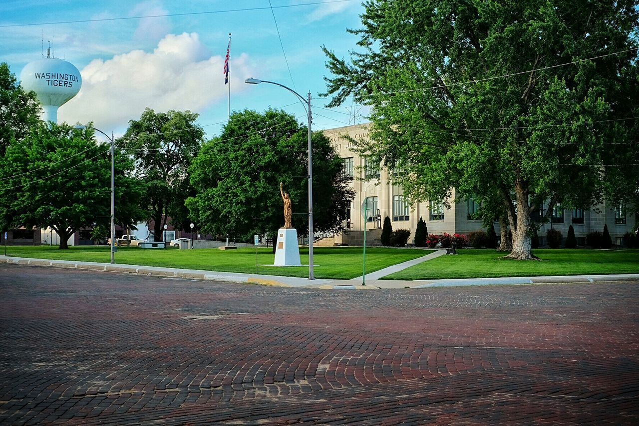 Cobblestone street by building