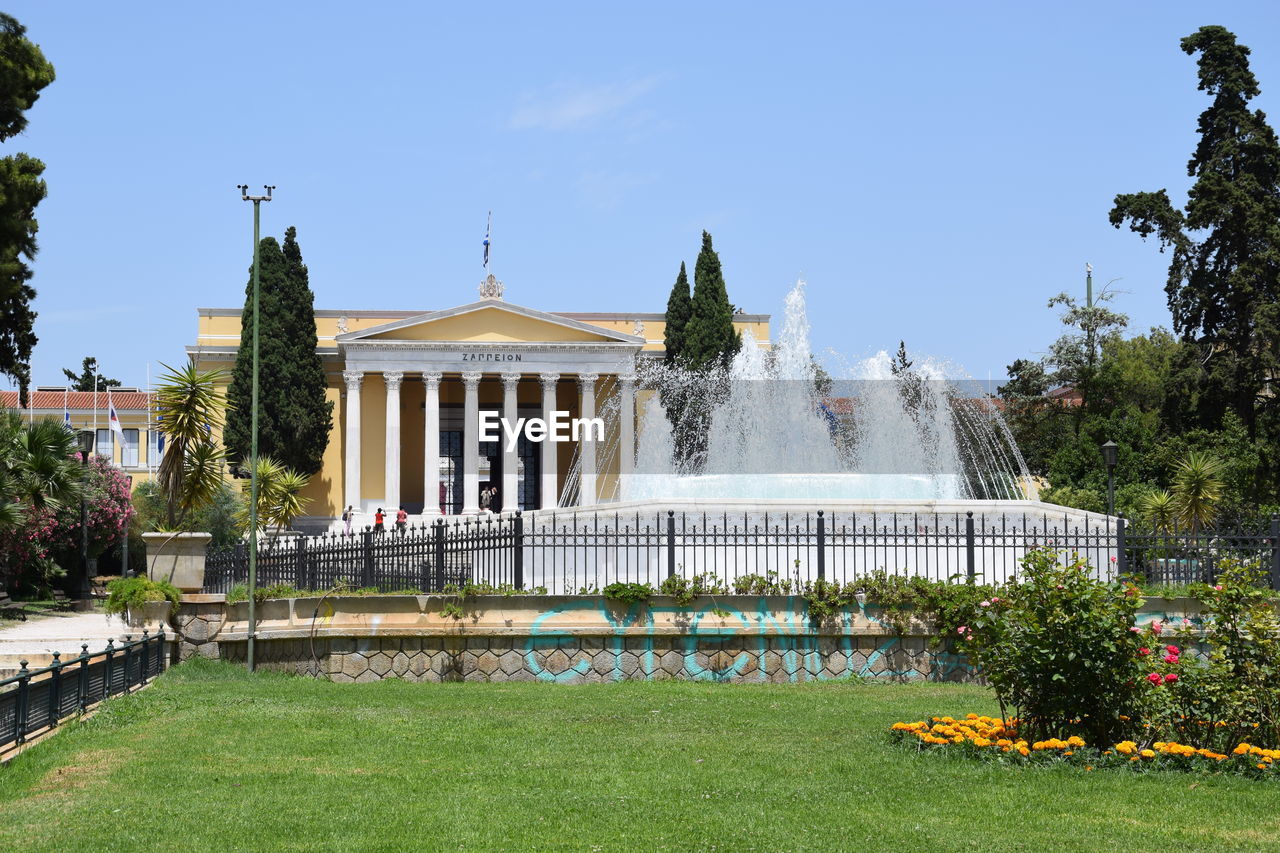 FOUNTAIN IN FRONT OF BUILDING