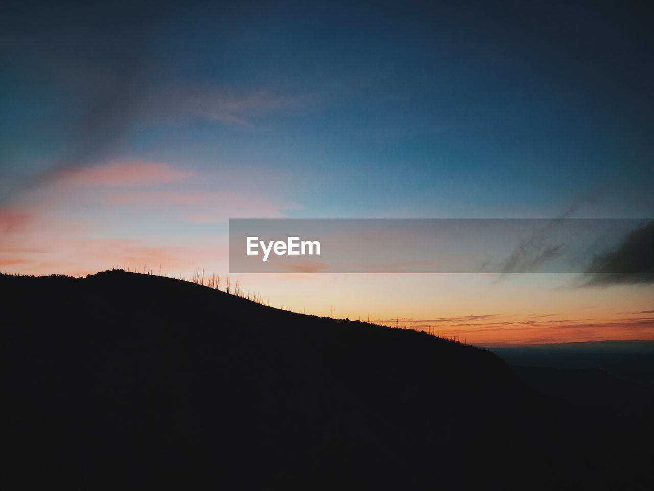 SCENIC VIEW OF SILHOUETTE LANDSCAPE AGAINST SKY