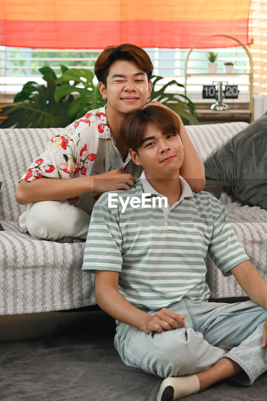 friends sitting on sofa