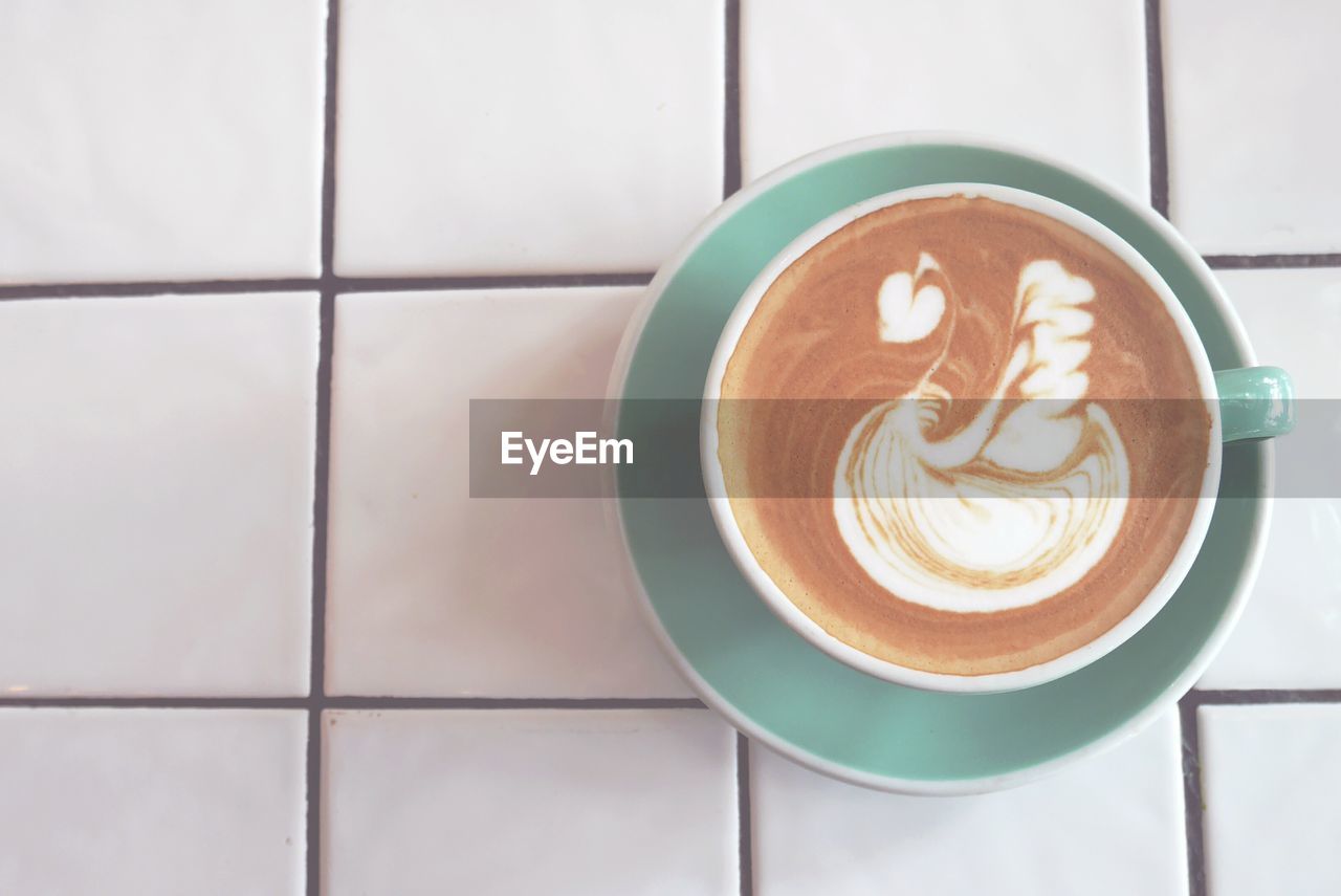 CLOSE-UP OF COFFEE ON TABLE