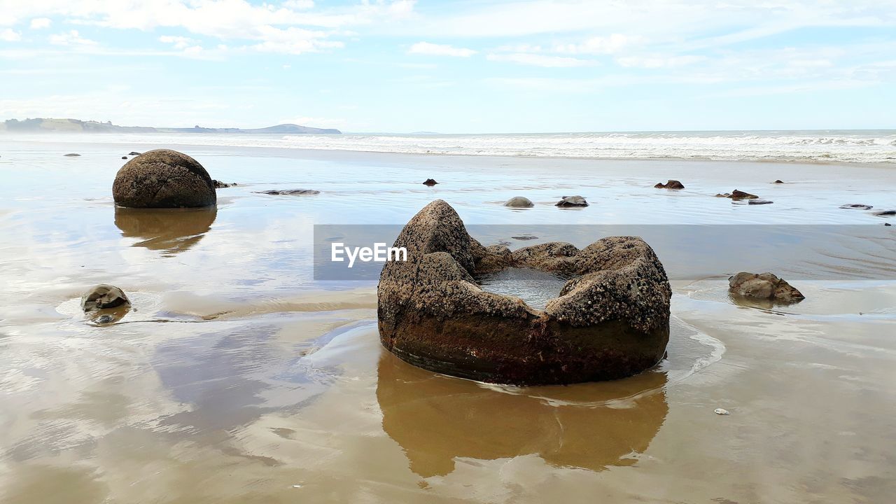 VIEW OF ROCKS ON BEACH