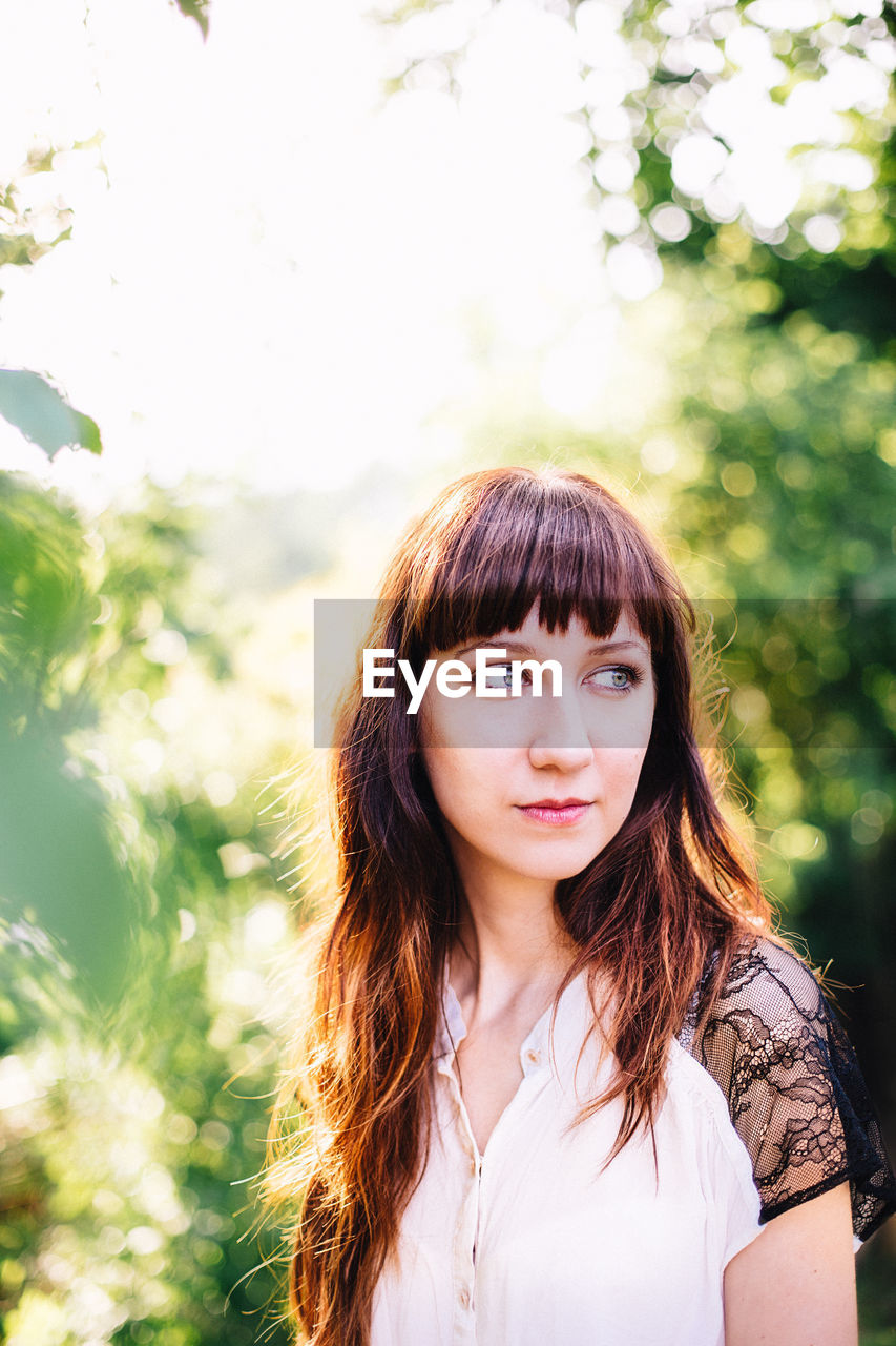 Portrait of beautiful young woman on a summers day 