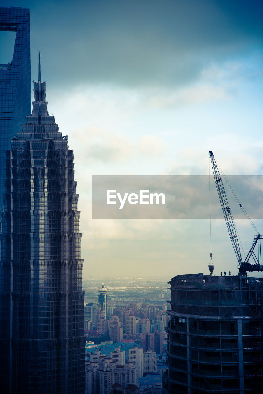 MODERN BUILDINGS AGAINST SKY