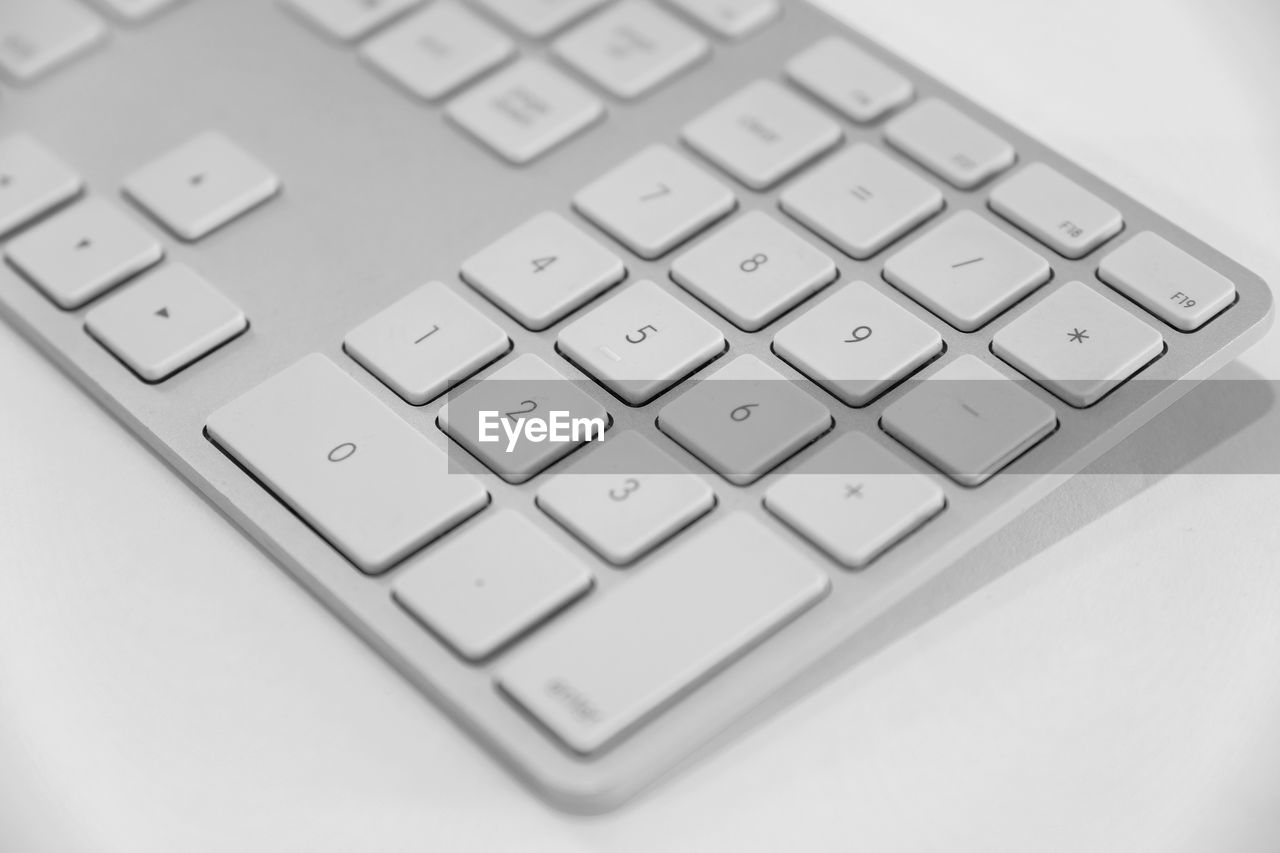 Close-up of computer keyboard on table