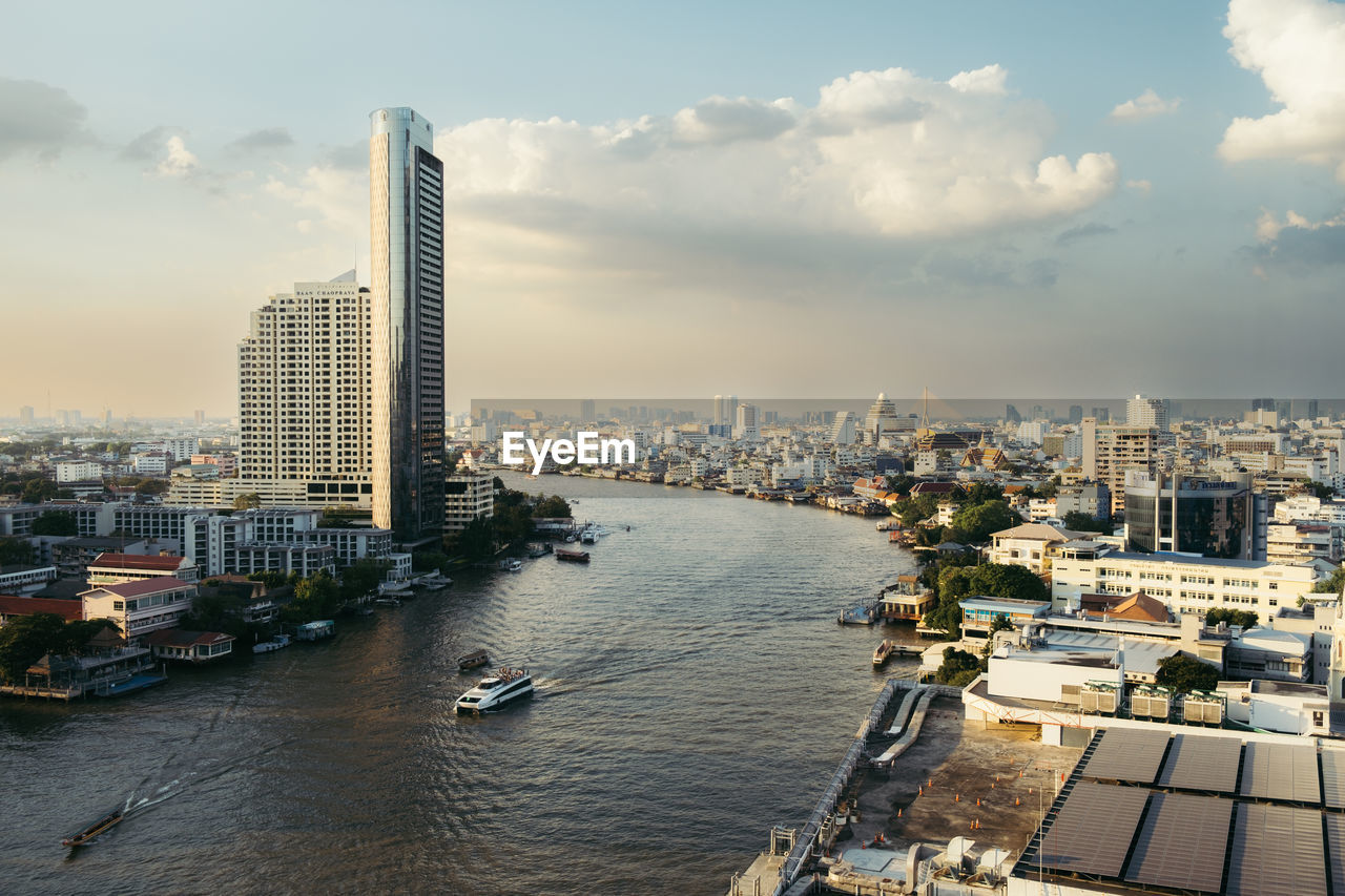 High angle view of city at sunset