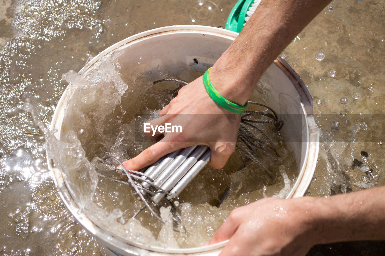 High angle view of man working in water