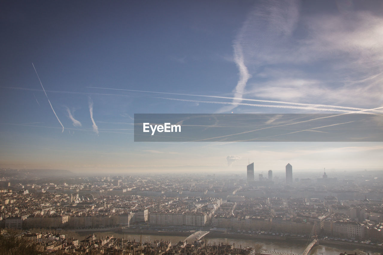 AERIAL VIEW OF CITY AGAINST SKY