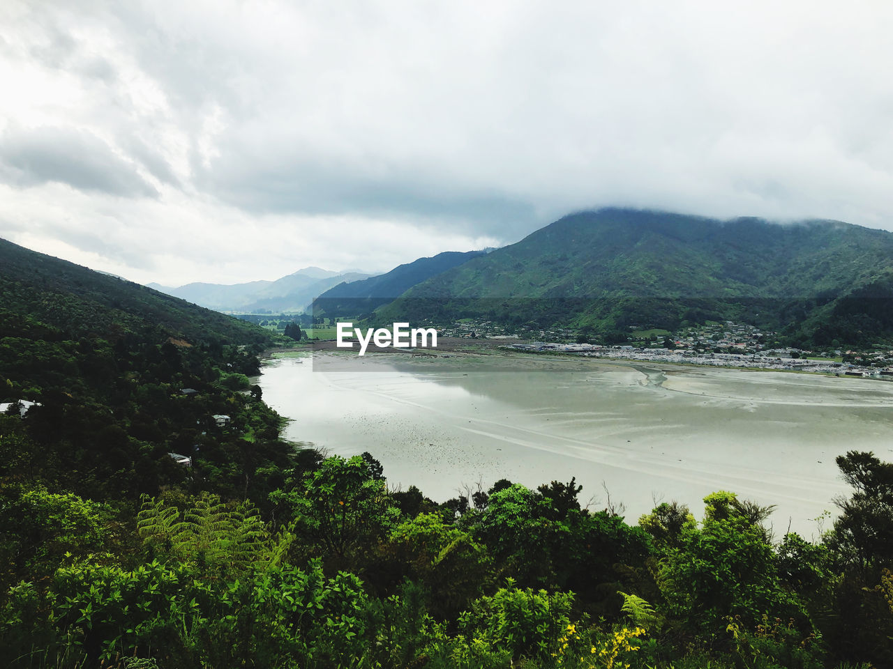 Scenic view of landscape and mountains against sky