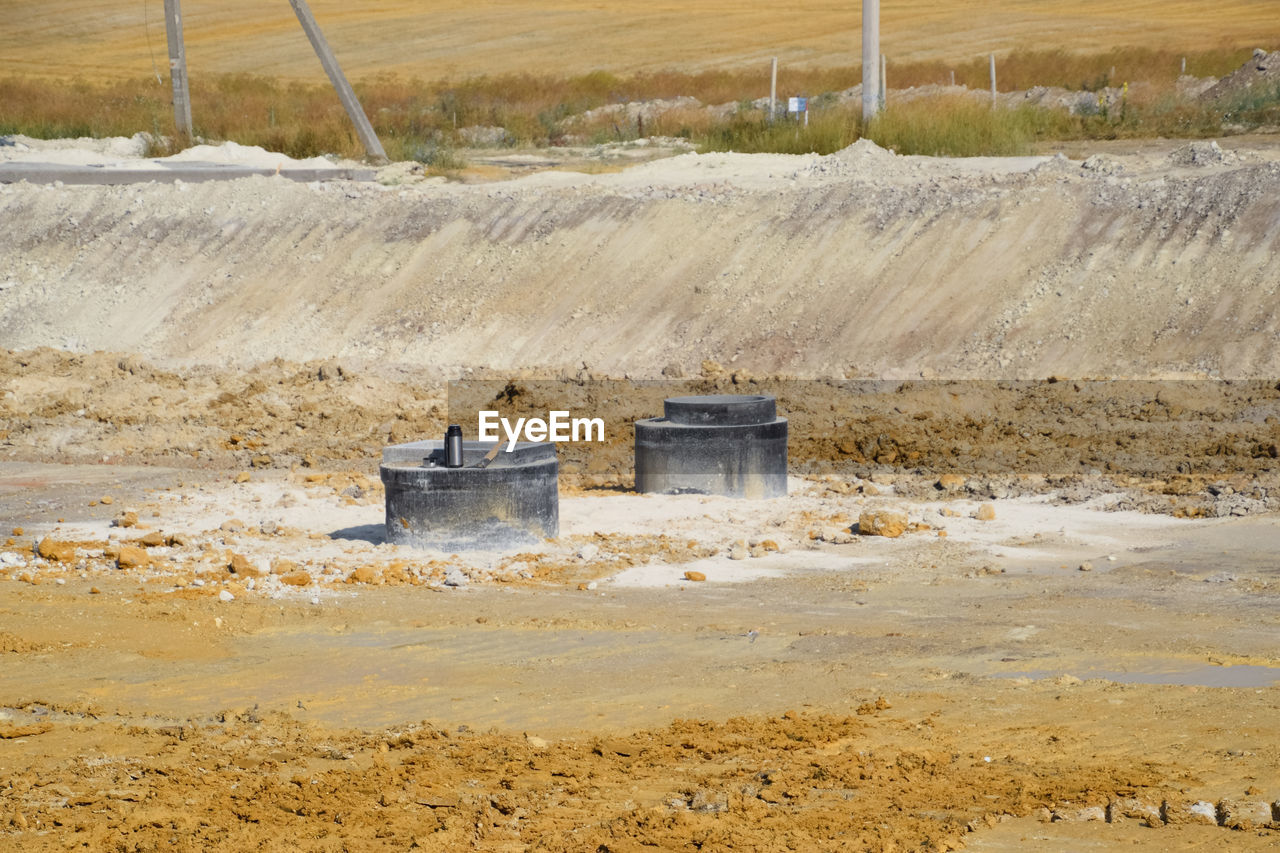 BUILT STRUCTURE ON LAND AGAINST THE SKY