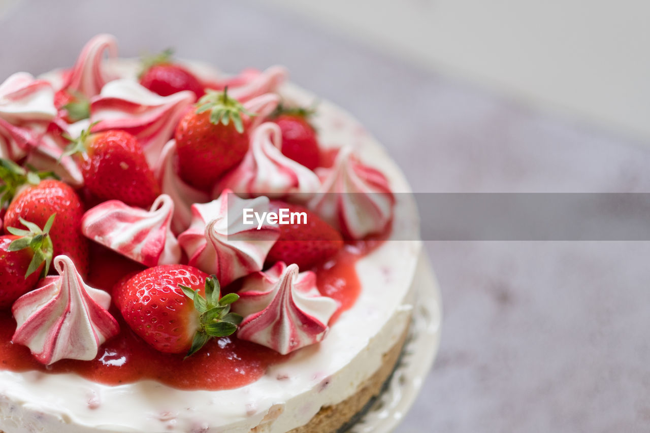 Close up of strawberry cheesecake with copy space