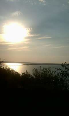 VIEW OF SEA AT SUNSET