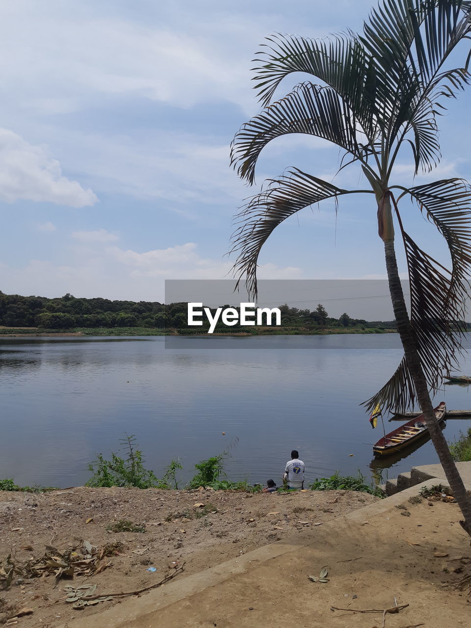 SCENIC VIEW OF LAKE AGAINST CLEAR SKY