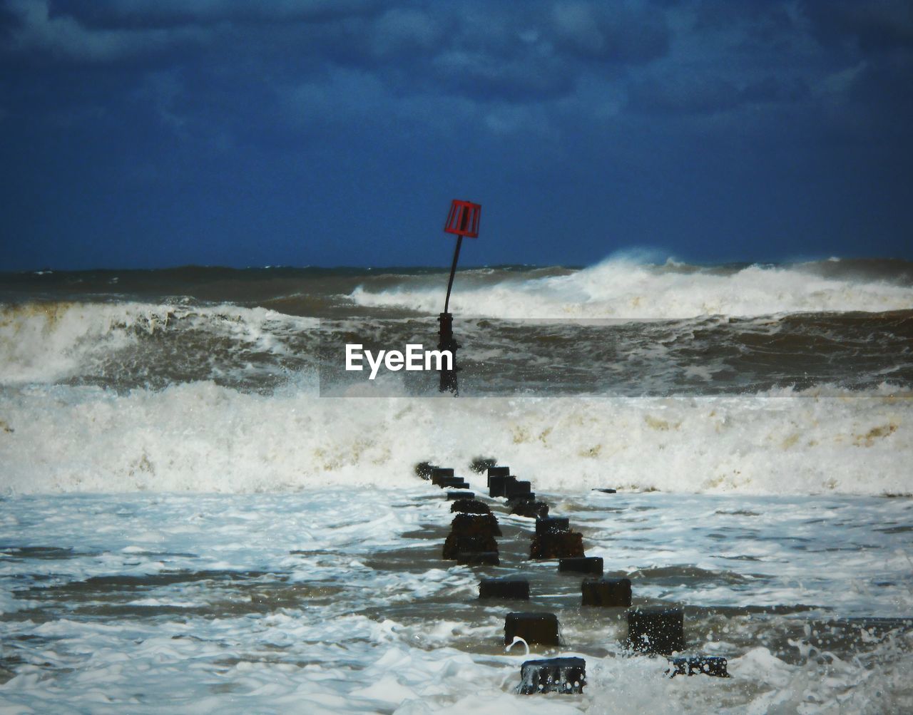 VIEW OF SEA AGAINST CLOUDY SKY