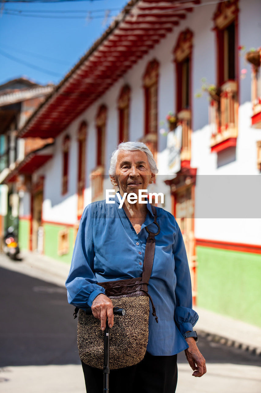 Senior woman tourist at the heritage town of salamina in the department of caldas in colombia