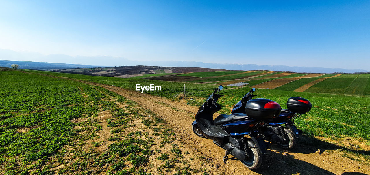 VIEW OF MOTORCYCLE ON ROAD