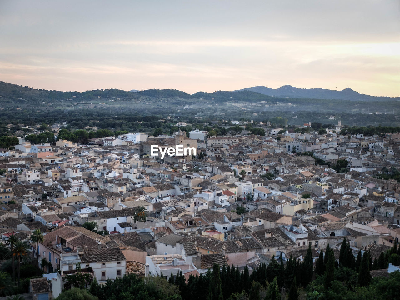 High angle view of cityscape against sky during sunset