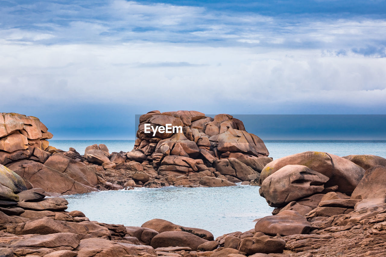 Cote de granit rose against cloudy sky