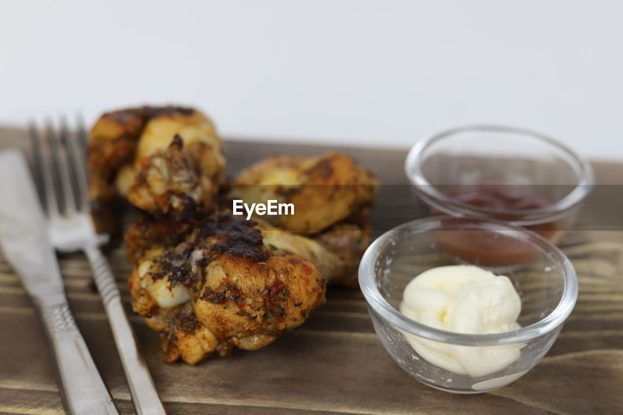 food and drink, food, dish, breakfast, dessert, freshness, meal, produce, healthy eating, indoors, no people, baked, studio shot, wellbeing, eating utensil, fried food, close-up, kitchen utensil, wood, cuisine, focus on foreground, household equipment, meat, vegetable, table