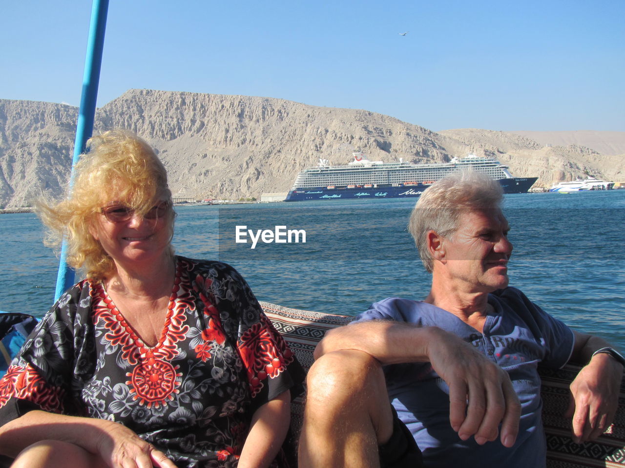 Man and woman sitting in ship