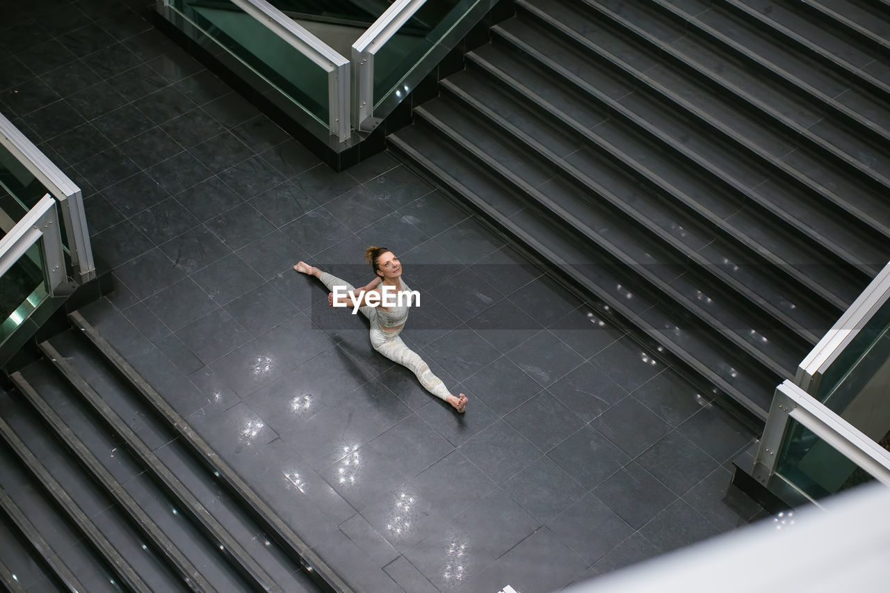 High angle view of woman doing yoga