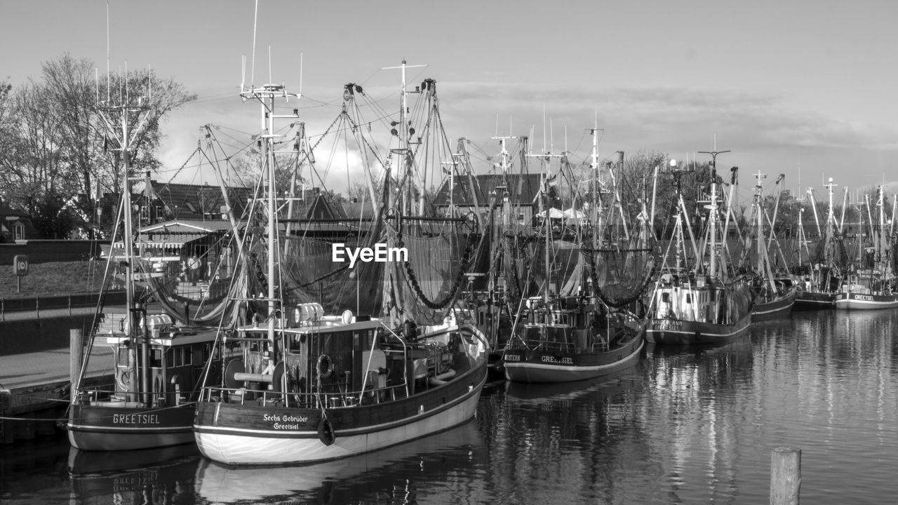 Boats moored in harbor