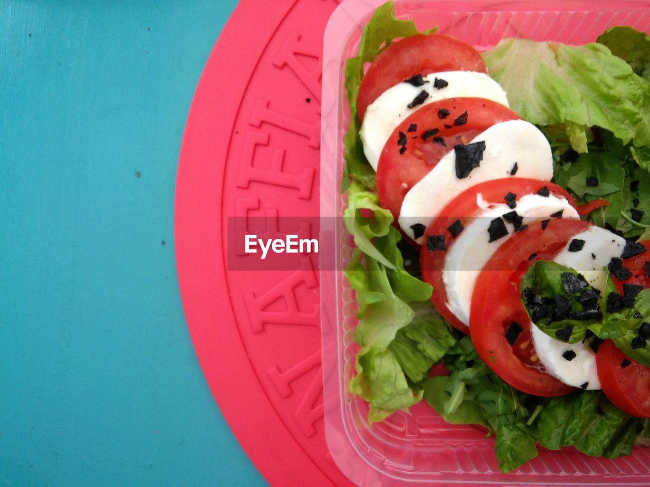 Directly above shot of salad in box on table