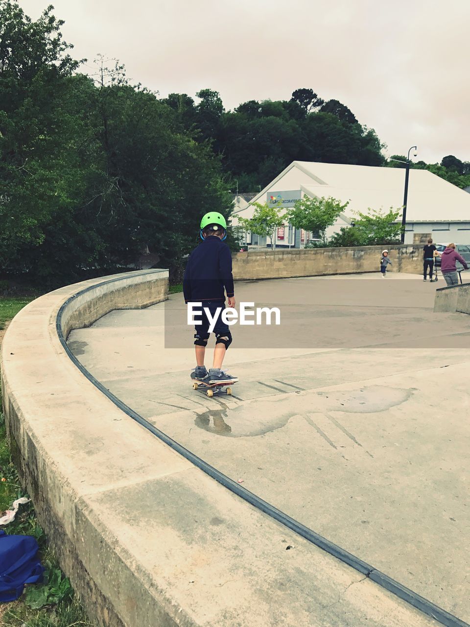 Rear view of boy on skateboard