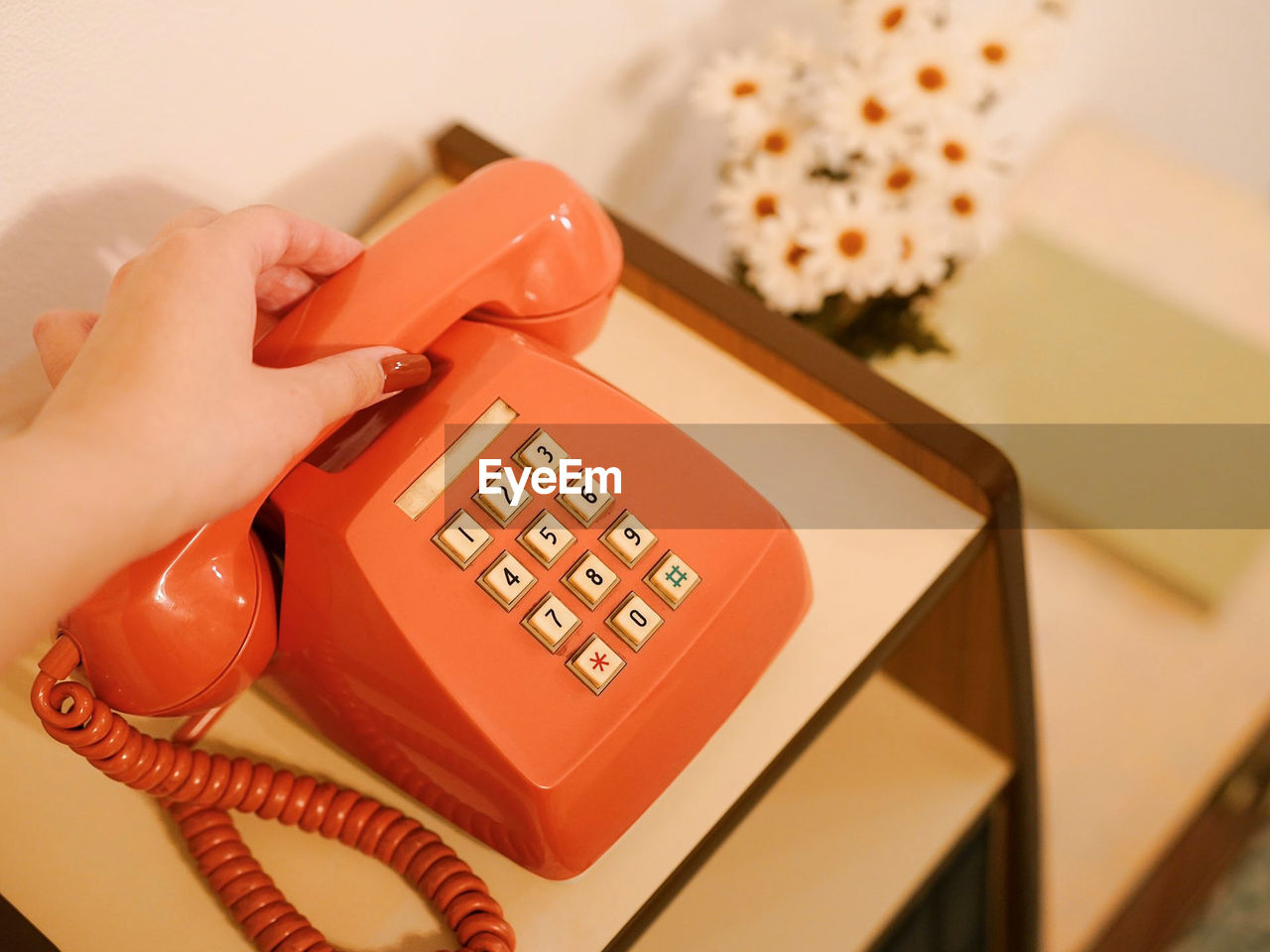 high angle view of telephone on table