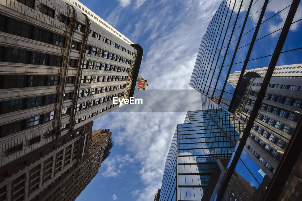 LOW ANGLE VIEW OF BUILDINGS AGAINST SKY