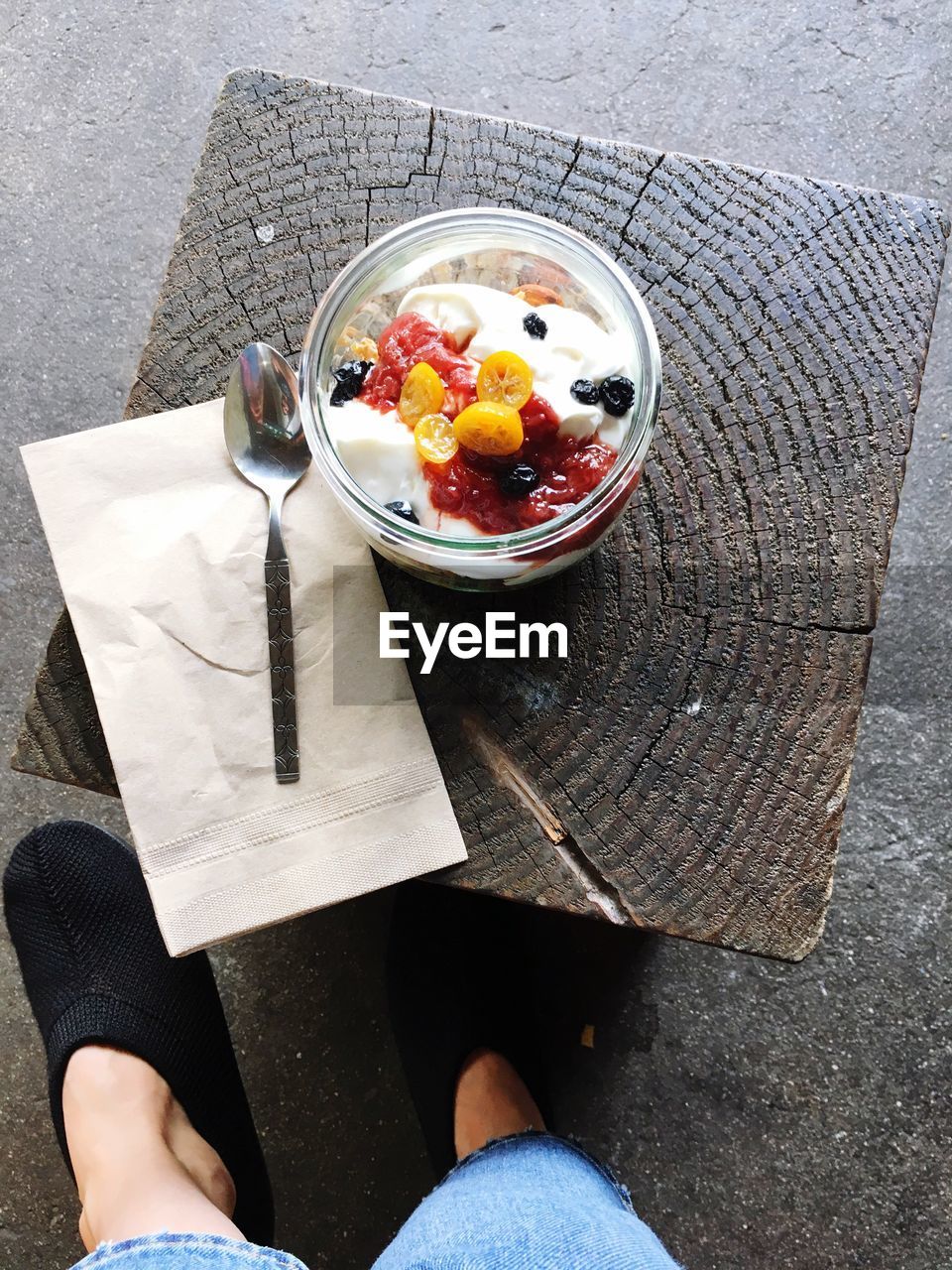 HIGH ANGLE VIEW OF WOMAN WITH FRUITS