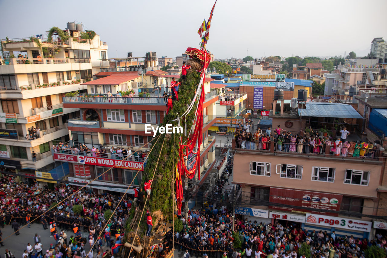 Devotees pull chariots as they take part in the festivities to mark the rato machindranath chariot.