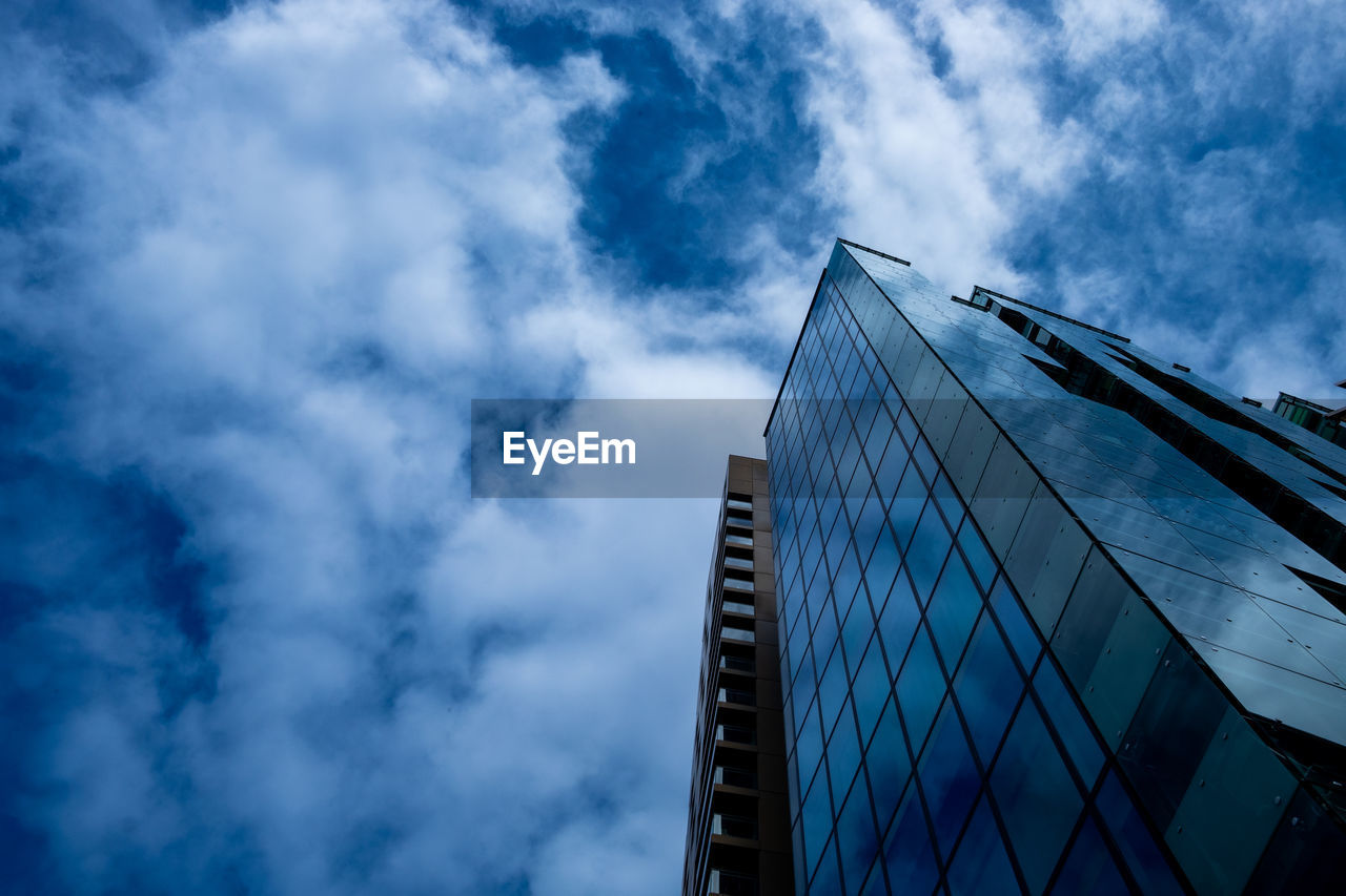 LOW ANGLE VIEW OF BUILDINGS AGAINST SKY