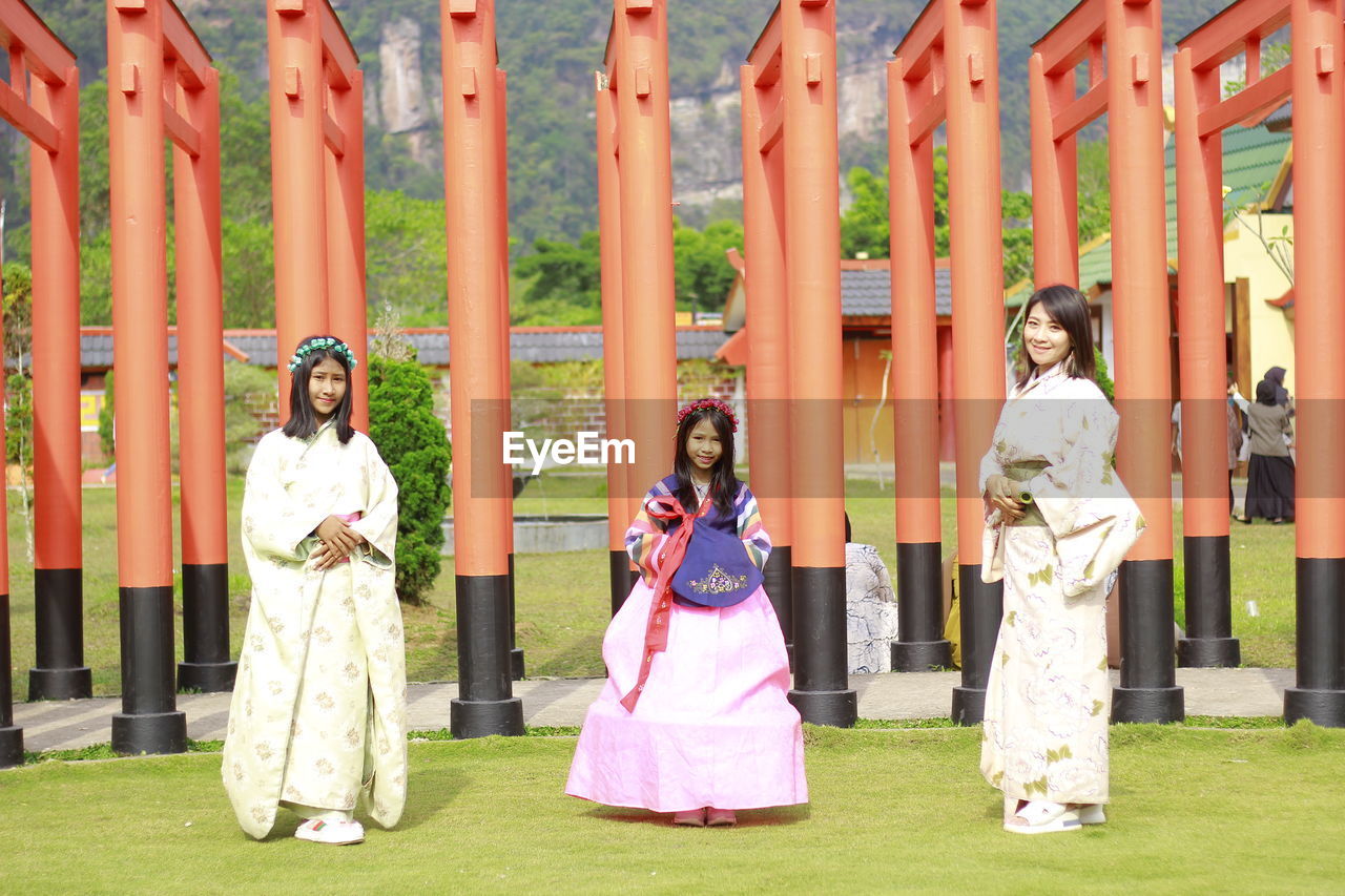 Beautiful women dressed in traditional japanese and korean