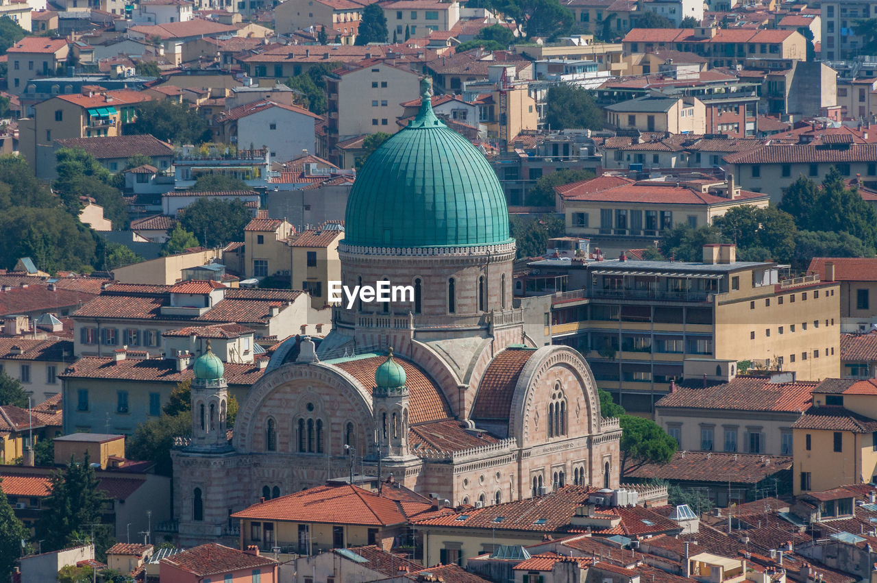 Aerial view of synagogue and museum building with green dome in florence, italy