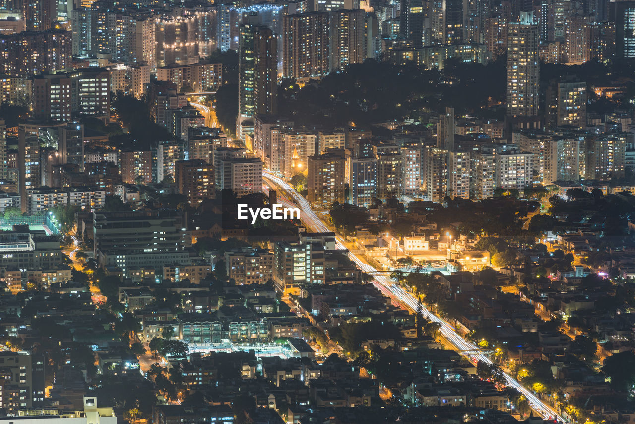 Aerial view of illuminated cityscape at night