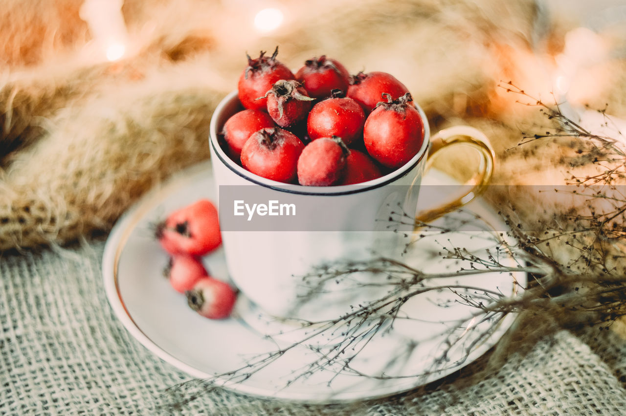 Close-up of fruits in bowl on table