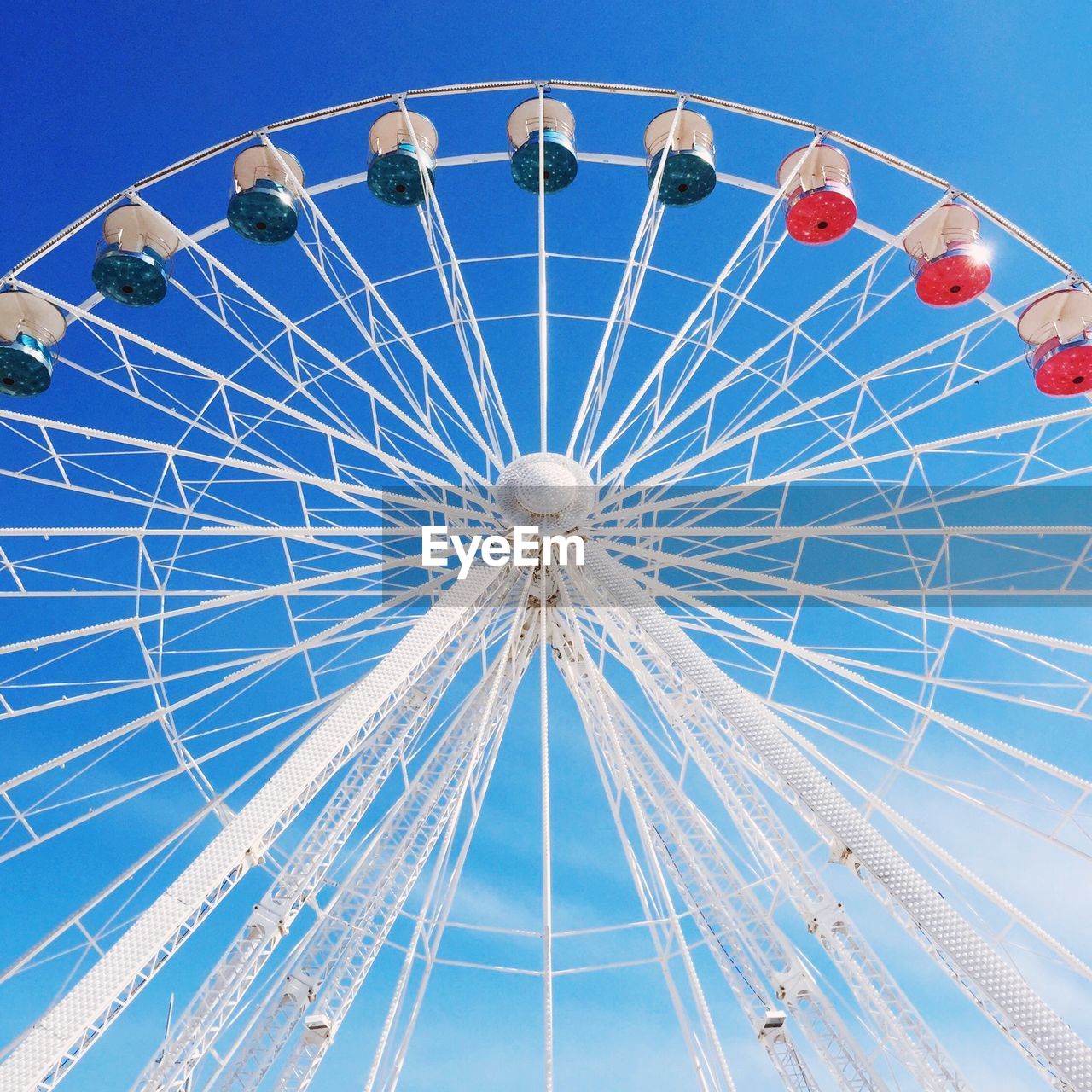 LOW ANGLE VIEW OF FERRIS WHEEL AGAINST SKY