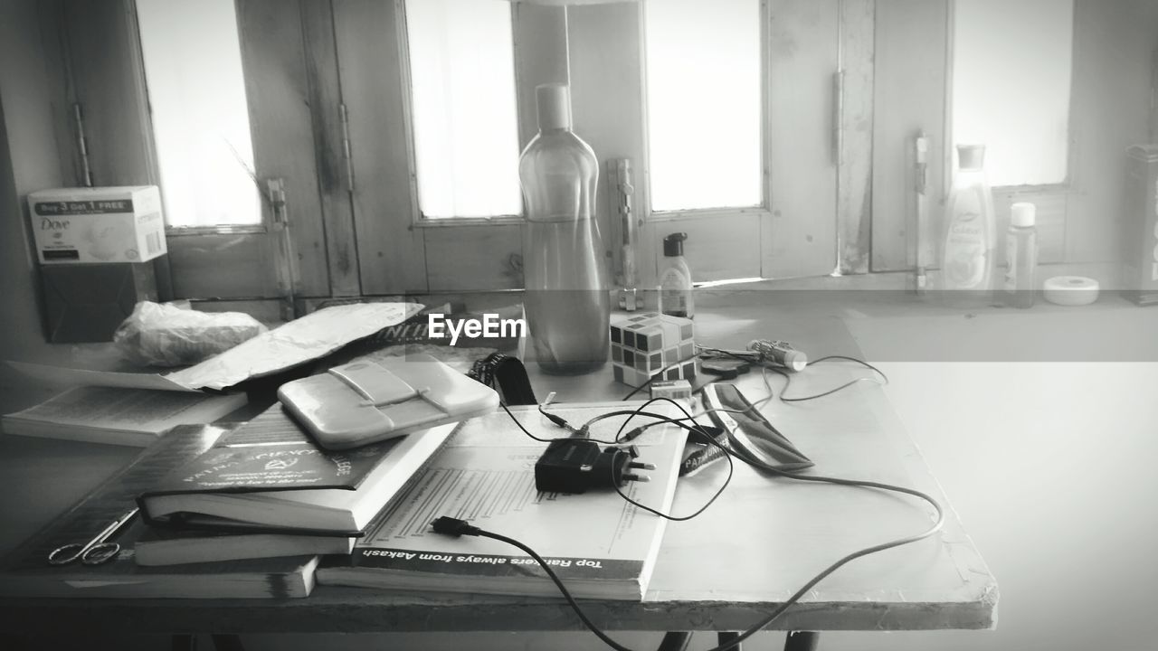 OPEN BOOK ON TABLE IN KITCHEN