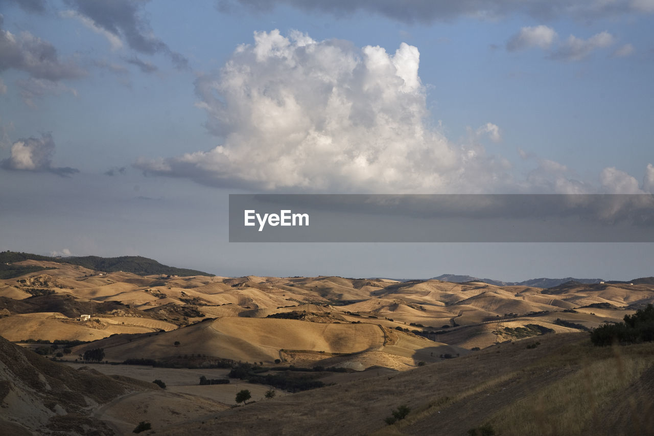 Scenic view of desert against sky