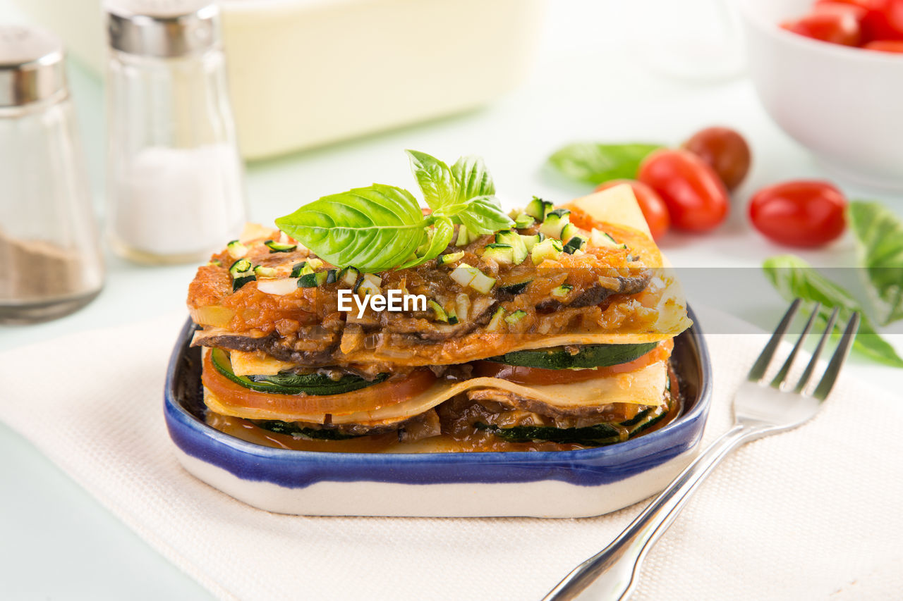 Close-up of lasagna in bowl on table