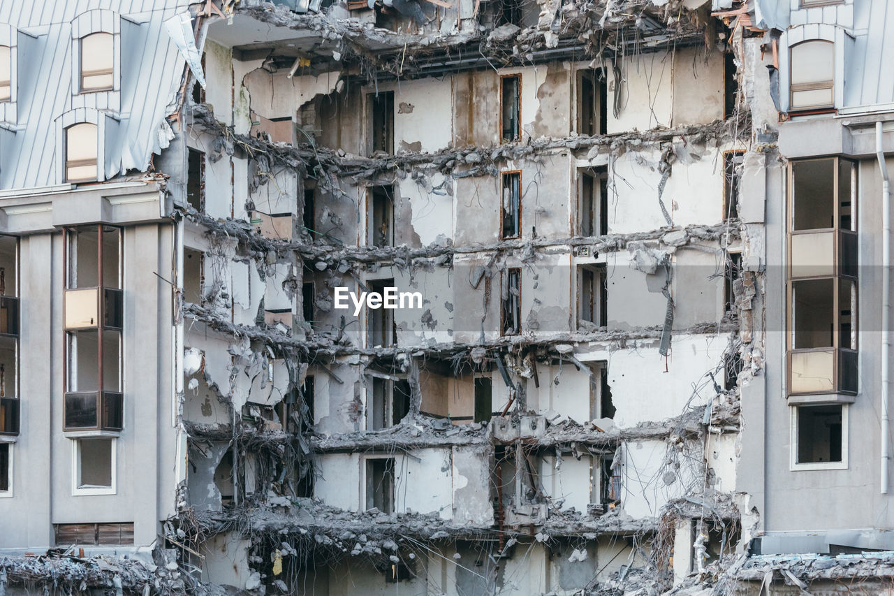 Photo of destroyed building, former hotel 5 stars, demolition of a building, house ruins