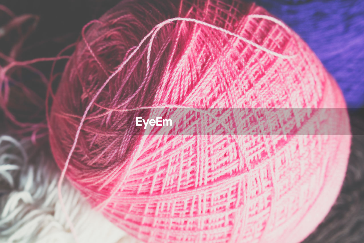 Close-up of pink string balls