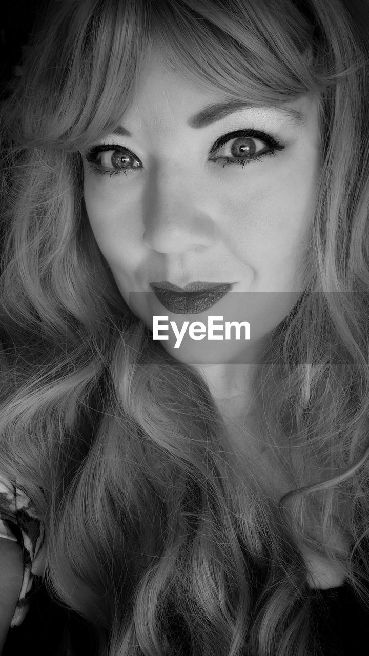 portrait, one person, women, black and white, hairstyle, long hair, looking at camera, adult, young adult, human hair, human face, monochrome, monochrome photography, headshot, brown hair, fashion, black, portrait photography, studio shot, make-up, front view, close-up, white, blond hair, photo shoot, glamour, indoors, person, female, elegance, smiling, human eye, emotion