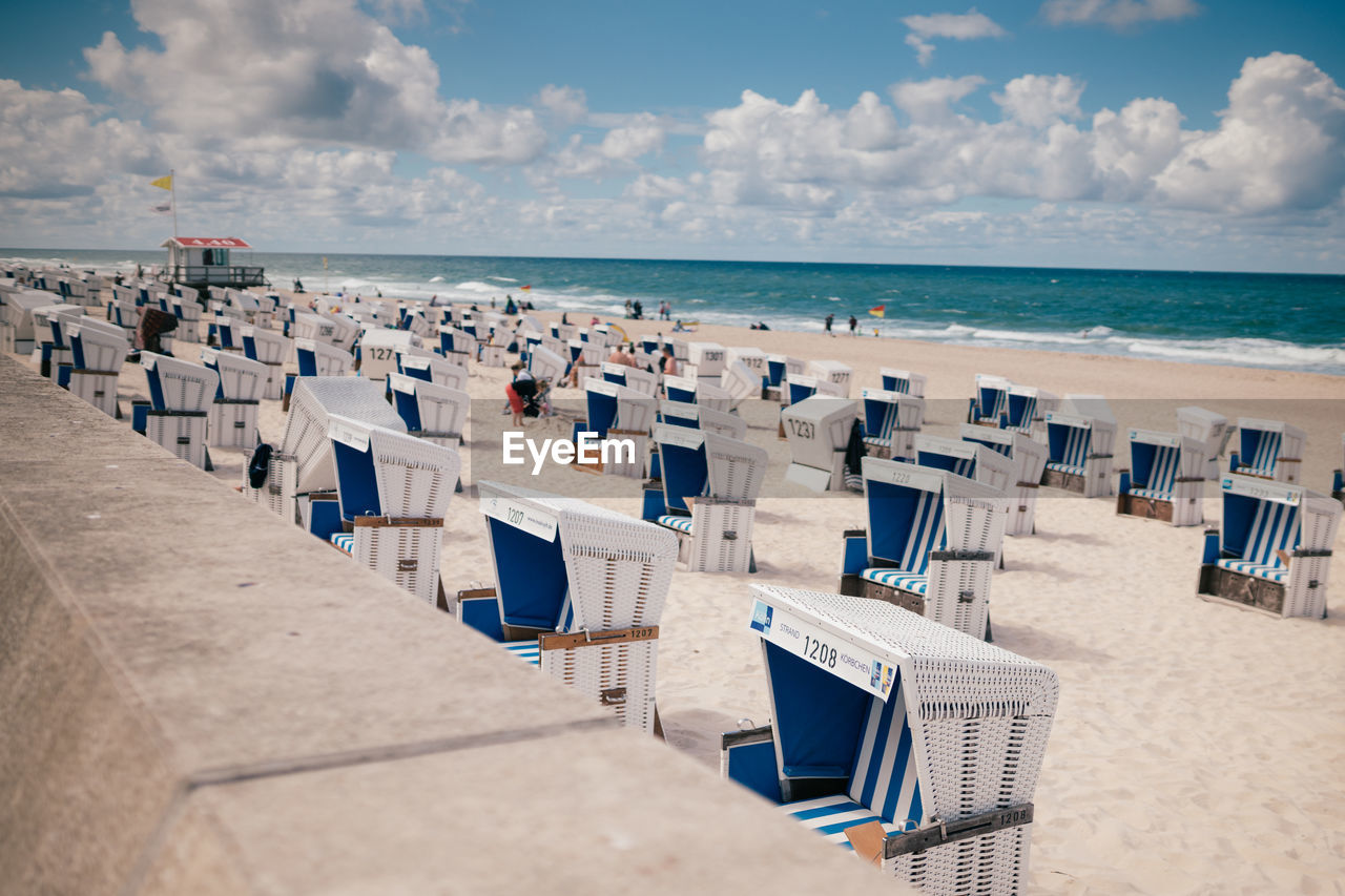 HOODED CHAIRS ON BEACH