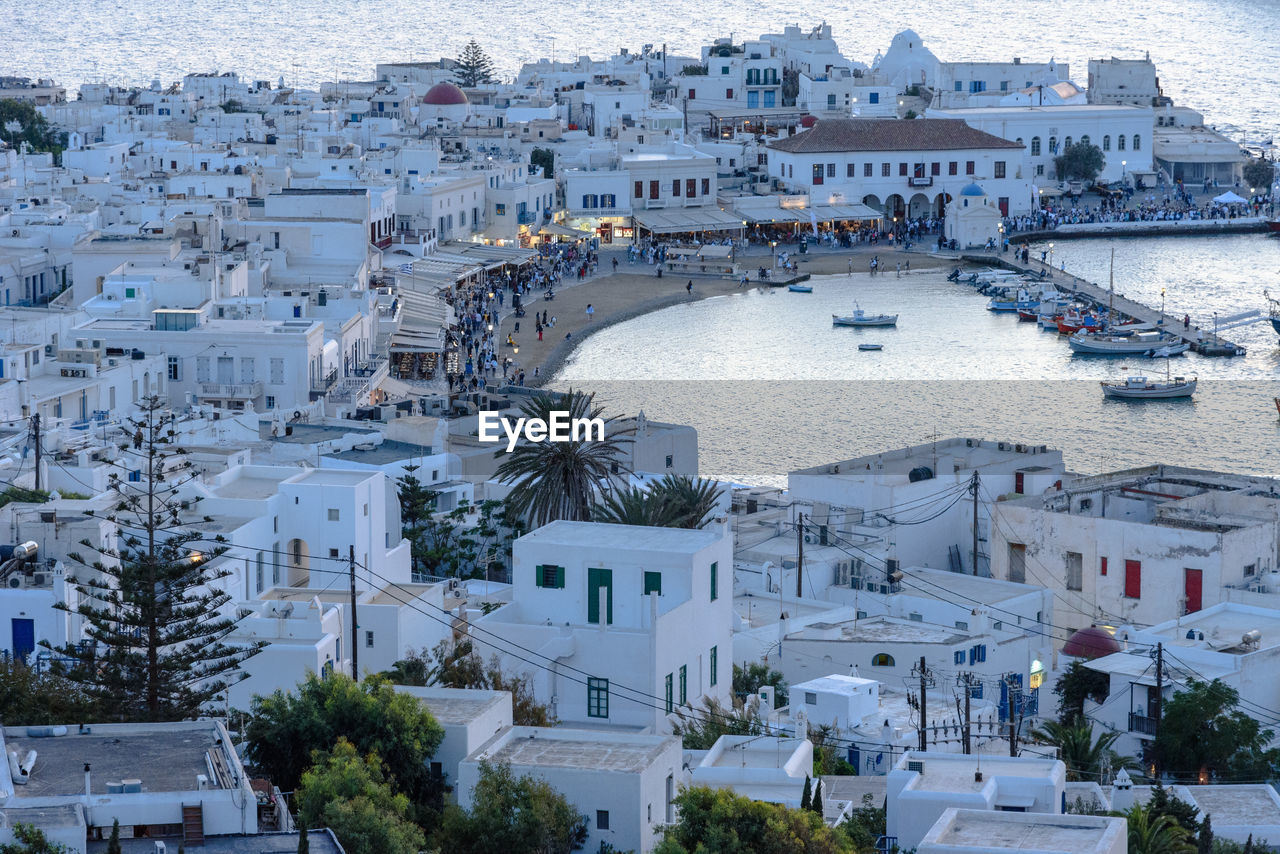 HIGH ANGLE VIEW OF BUILDINGS AT WATERFRONT