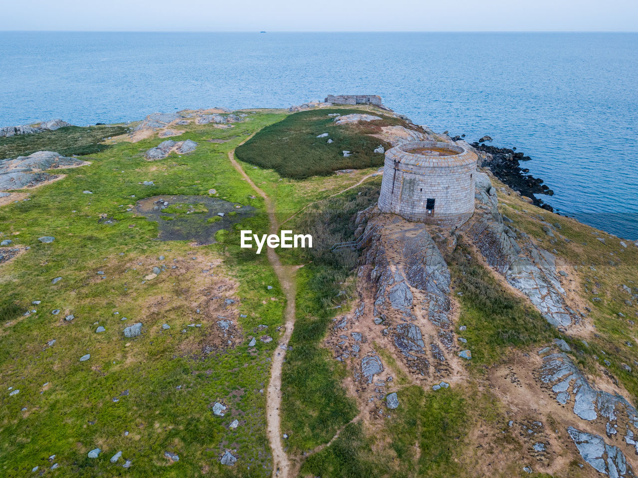 HIGH ANGLE VIEW OF CASTLE ON BEACH