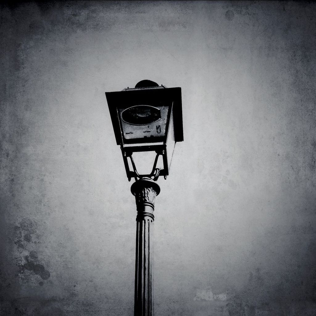 Street light against sky