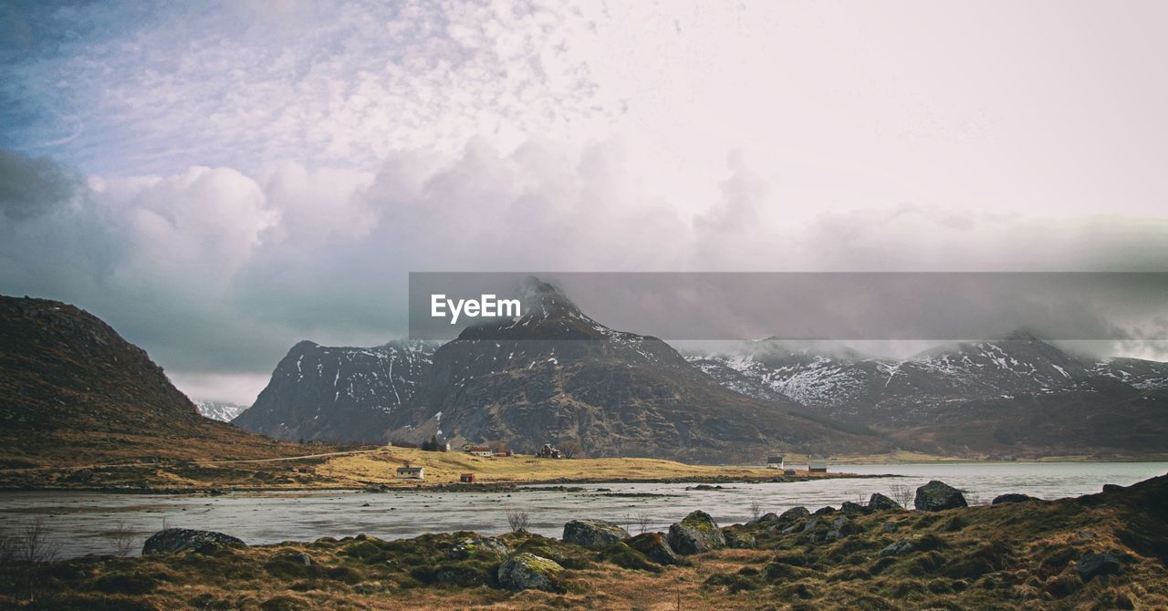 Scenic view of snowcapped mountains against sky